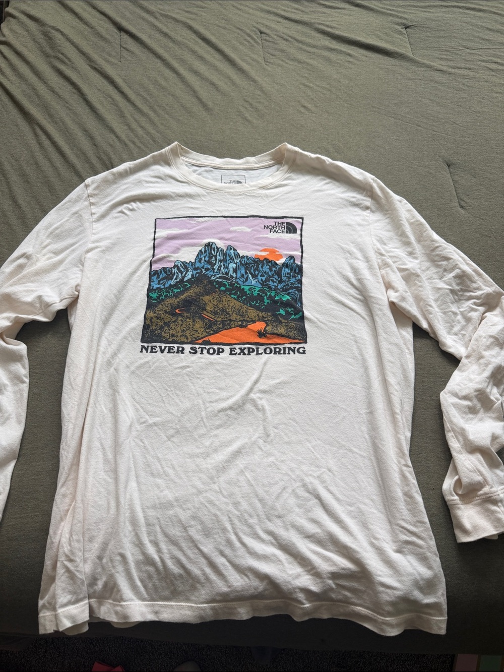 The North Face White Long-Sleeve Tee with Colorful Mountain Graphic